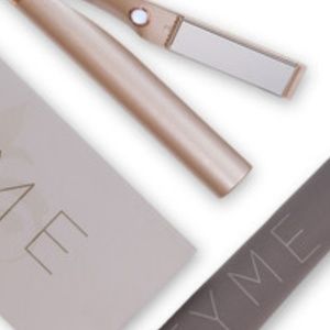 BRAND NEW TYME 2 in 1 straightener / curling iron.